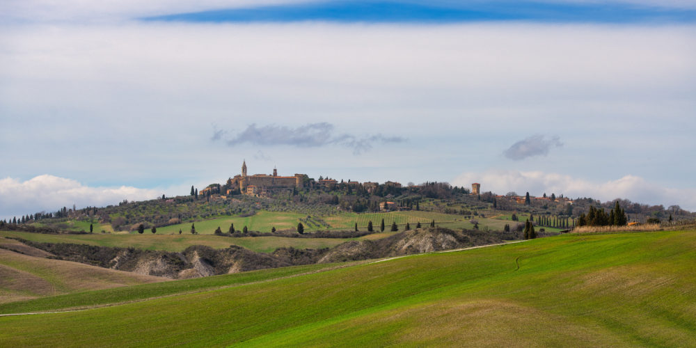 The Val d'Orcia in Tuscany Italy with the medieval village of Pienza